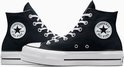 Zwarte Converse All Star Lift sneakers met witte zolen, witte veters en kenmerkend logo op de zijkant.