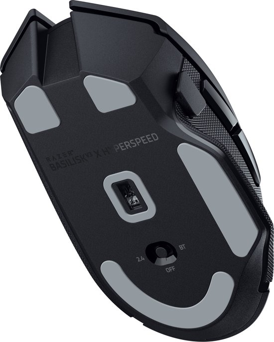 Onderkant van zwarte Razer Basilisk V3 X Hyperspeed muis met grijze glijders en draadloze modus-schakelaar.