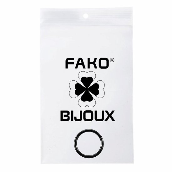 Verpakking met FAKO BIJOUX logo, klavertje vier en een zwarte ring.