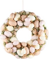 Paaskrans met kleurrijke eierdecoratie en kunstbloemen, lentekrans