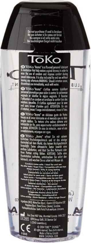 Arrière de la bouteille de lubrifiant Toko Aroma avec liste des ingrédients et marque CE.