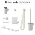 Set van Tiger toiletaccessoires in wit: zeepdispenser, haakjes, dubbele handdoekhouder, toiletborstelhouder, toiletrolhouder en reserverolhouder.