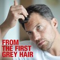Man met grijs haar die aan zijn haar frummelt. Tekst: 'FROM THE FIRST GREY HAIR'.