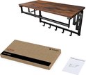 Wandkapstok met houten plank, kledingstang en zes haken, naast de verpakking en handleiding.
