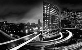 Fotobehang - Vlies Behang - Verlichte Grote Stad in zwart-wit - 312 x 219 cm