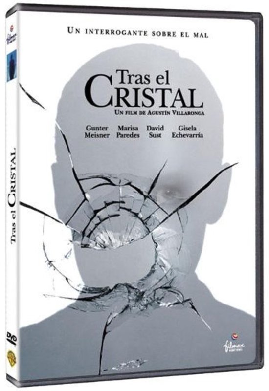 DVD-hoes van Tras el Cristal met gebarsten glas op de voorkant. 'Tras el Cristal' staat centraal.