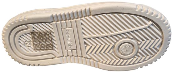Crèmekleurige rubberen zool met profiel van een sneaker, met 'develab' logo.