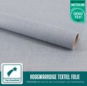 Een rol hoogwaardige, grijze textielfolie met een subtiel weefpatroon. "Top Kwaliteit".