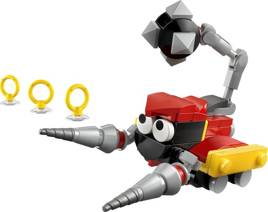 Een LEGO Badnik Skorp in rood en zwart met grijze grijper en gepantserde staart. Drie gouden ringen ernaast.