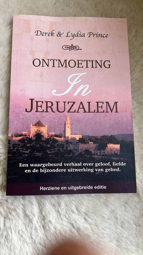 Boek 'Ontmoeting in Jeruzalem' met op de voorkant een afbeelding van de stad Jeruzalem en de tekst 'Derek & Lydia Prince'.