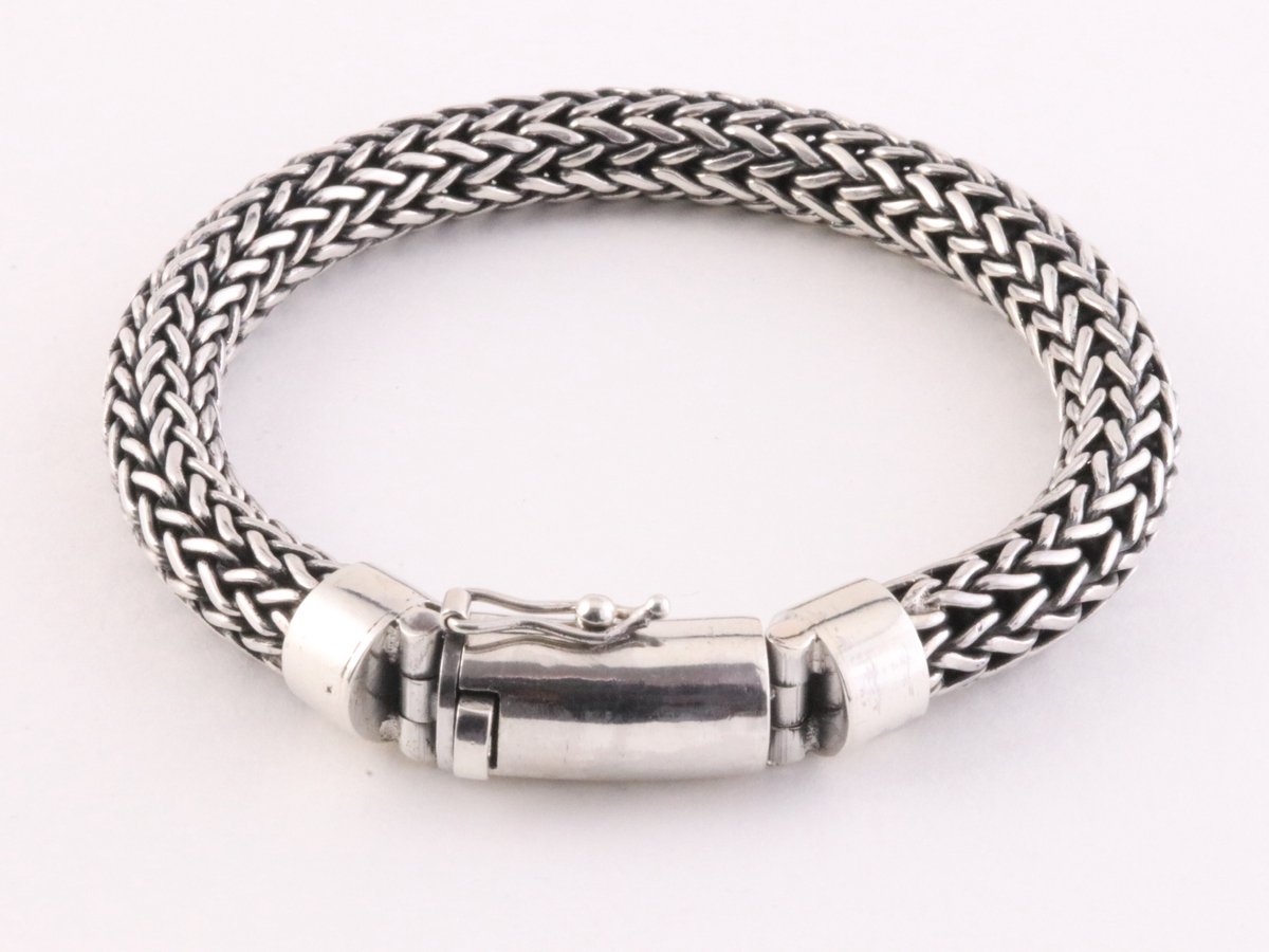 Zware ronde gevlochten zilveren armband met kliksluiting - pols 15.5 cm