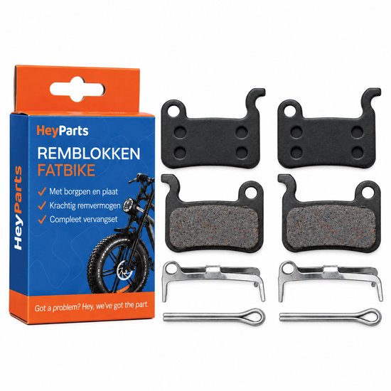 HeyParts fatbike remblokken set: inclusief twee zwarte blokken, twee metalen clips en borgpennen in oranje verpakking.