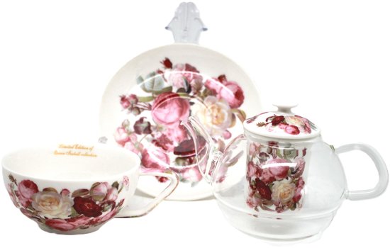 Queen Isabell kop, schotel en glazen theepot versierd met een rozenpatroon en tekst 'Limited Edition'.