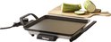 Tristar grillplaat met gesneden courgette op een houten snijplank ernaast.