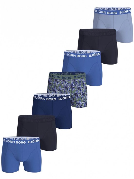 Zeven boxershorts van Björn Borg in verschillende kleuren en een met bloemenprint. Elastische tailleband met logo.