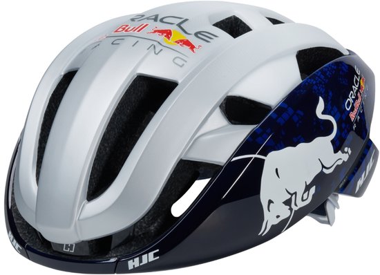 Wit fietshelm met blauwe zijkanten, een witte stier en Red Bull Racing logo's.