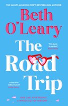 Boek 'The Road Trip' van Beth O'Leary met hartjesbril op de titel.