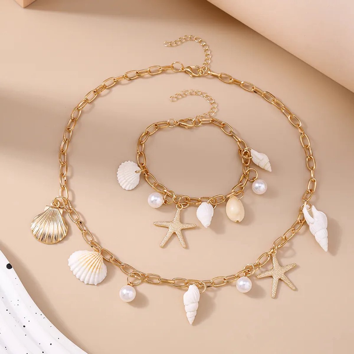 Jomide Sieradenset Beach Shell - Ketting/Armbandje - Goudkleurig
