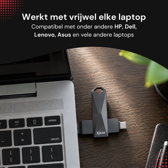 Grijze Xedor USB-stick met de tekst "Werkt met vrijwel elke laptop" en logo's van HP, Dell, Lenovo, Asus.