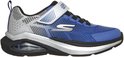 Blauwe Skechers sneaker met grijze en zilverkleurige details, klittenbandsluiting en luchtdemping in de zool.