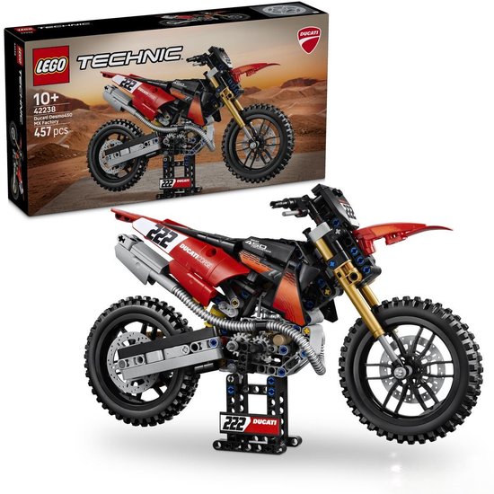 Lego Technic Ducati motorfiets op stand, naast de verpakking. Rood met zwart en goud, nummer 222.