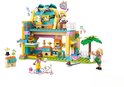 Set LEGO Friends de boutique d'accessoires pour animaux aux couleurs rose, jaune et bleu, sur fond blanc.