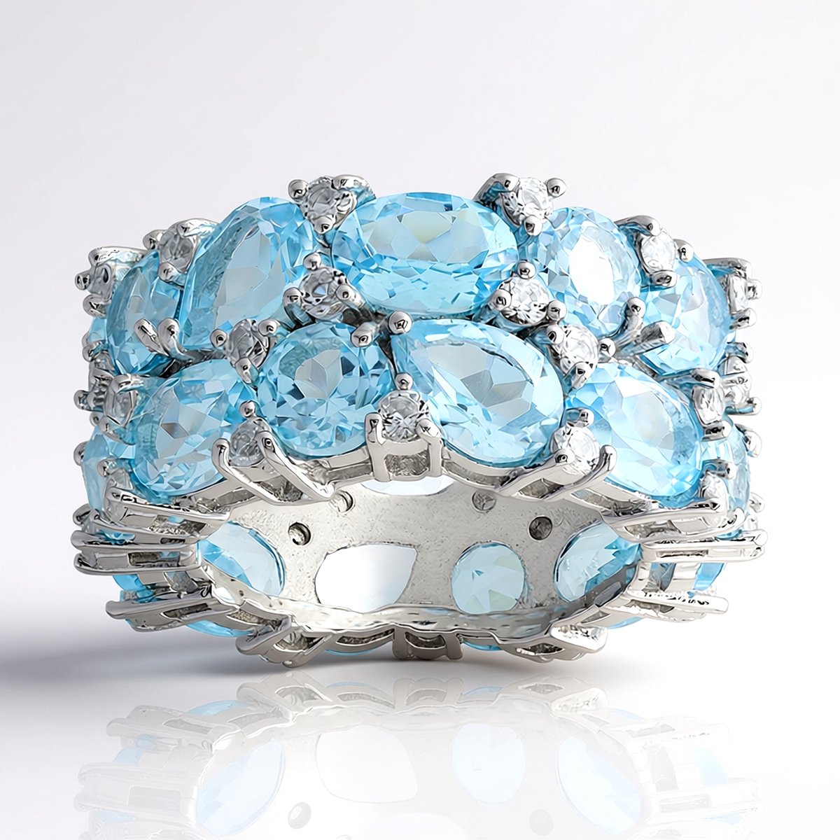 Cavill - Zilveren ring met hemelblauwe topaas 18,81 ct - 925 sterling zilver gerhodineerd - ovale, peervormige & ronde topaas - luxe brede ring