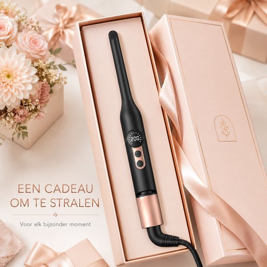 Zwarte krultang met rosé gouden details in een roze geschenkdoos, met bloemen en linten.