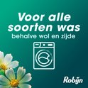 Tekst 'Voor alle soorten was behalve wol en zijde' met icoon van wasmachine en bloemen.