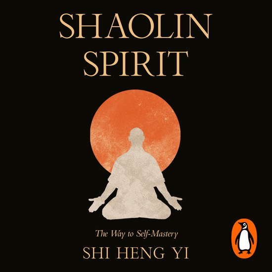 Boek 'Shaolin Spirit' met een oranje cirkel en een mediterend figuur op een zwarte achtergrond.