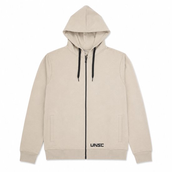 Lichtbeige hoodie met zwarte rits, trekkoorden en een UNSC-logo op de onderrand links.