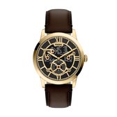 Gouden Fossil horloge met zwarte wijzerplaat, Romeinse cijfers en bruine lederen band.