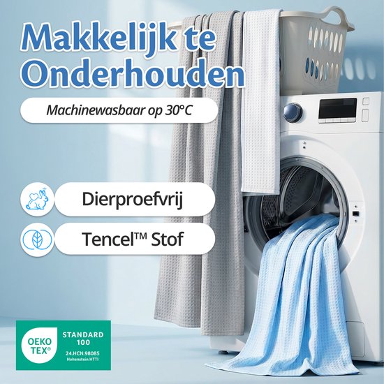 Een hemelsblauwe en grijze deken in een wasmachine, makkelijk te onderhouden, machinewasbaar op 30°C, dierproefvrij, Tencel™ Stof.