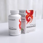 Aligma Astaxanthine fles en doosje op een witte ondergrond. De doos toont de voedingswaarde.