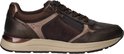 Bruine Tamaris sneaker met rits, verschillende bruine texturen en beige accenten.