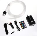 Lichtvezel, zwarte lichtmotor, afstandsbediening, auto-adapter en kabels.