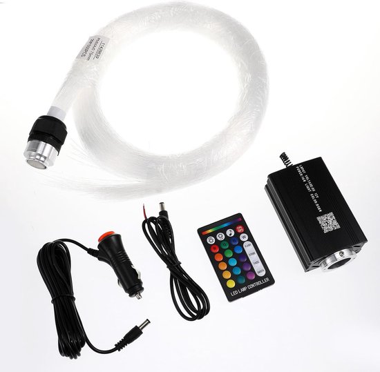 Lichtvezel, zwarte lichtmotor, afstandsbediening, auto-adapter en kabels.