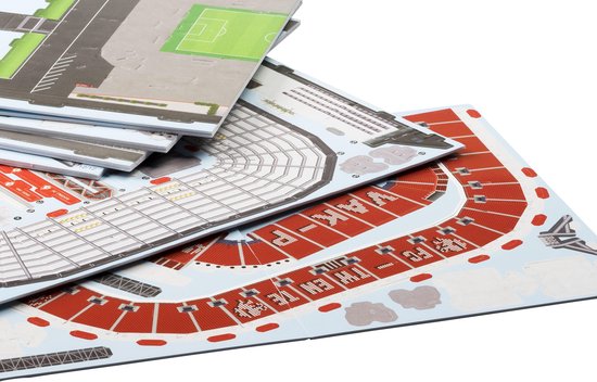 Losse onderdelen van 3D puzzel De Grolsch Veste met rode tribunedetails.