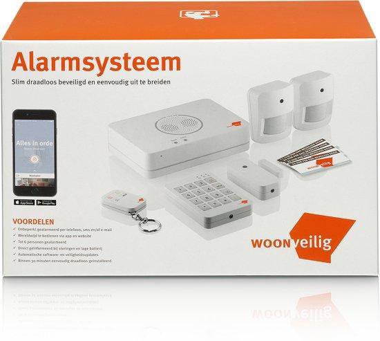 WoonVeilig alarmsysteem: centrale unit, toetsenbord, twee bewegingsmelders, contactsensor, sleutelhanger en app.