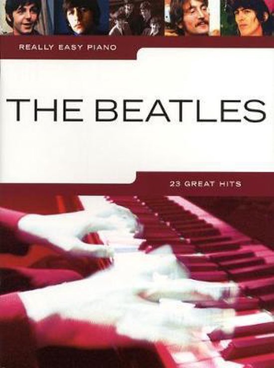 Boek "The Beatles: 23 Great Hits" met foto's van de band en spelende handen op een piano.