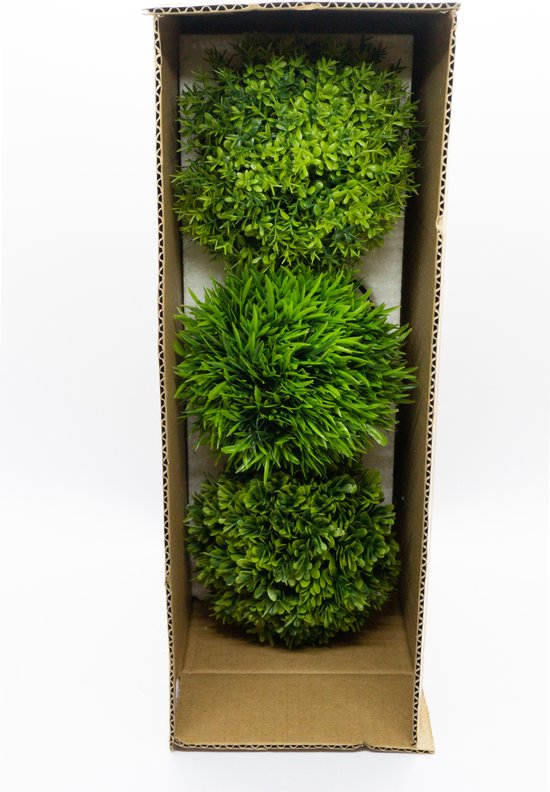 Trois plantes artificielles vertes aux feuillages différents, emballées dans une boîte.