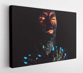 Portret van een meisje geschilderd in fluorescerend poeder. Halloween concept - Modern Art Canvas - Horizontaal - 1194540670 - 50*40 Horizontal