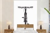 Behang - Fotobehang Een vooraanzicht van een mountainbike fiets - Breedte 160 cm x hoogte 240 cm