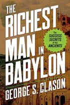 Boek 'The Richest Man in Babylon' met de titel groot op de cover, met een illustratie van een oude toren.