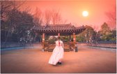 Vrouw in traditionele jurk bij een zonsondergang in Seoul - Foto op Forex - 45 x 30 cm