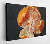 Canvas schilderij - A few tangerines close-up on a black background  -     780583615 - 50*40 Horizontal
