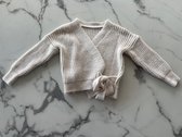 Overslagvest voor meisjes in de kleur Beige, verkrijgbaar in de maten 104/4 t/m 164/14