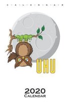 Owl sticked to tree in front of Moon Calendar 2020