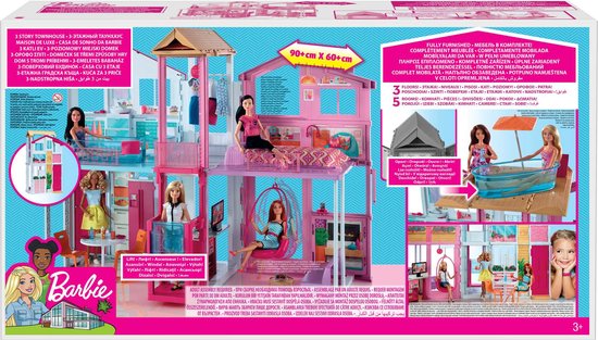 Doos van Barbie Malibu huis met 3 verdiepingen en speelgoedpoppen.