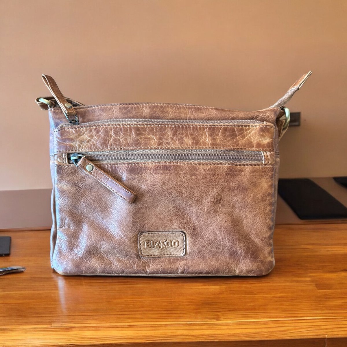 Bizzoo bag with long shoulder strap and front pocket cognac